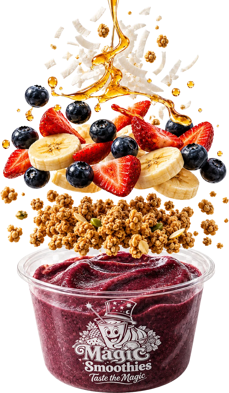 Açaí bowl with granola, banana, strawberries, blueberries, coconut and a honey drizzle